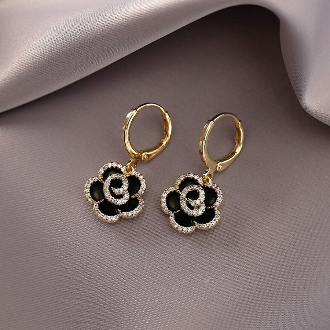 Elegantes Brinco de Lótus Preto: O acessório perfeito para qualquer ocasião!