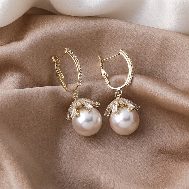 Pendentes de Pérola Malia Glamourosos – O acessório perfeito para qualquer ocasião!