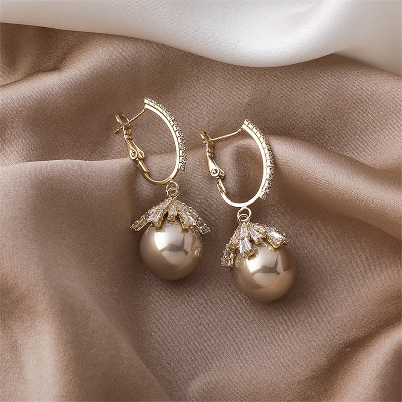 Pendentes de Pérola Malia Glamourosos – O acessório perfeito para qualquer ocasião!