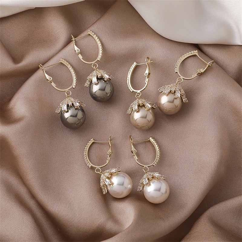 Pendentes de Pérola Malia Glamourosos – O acessório perfeito para qualquer ocasião!