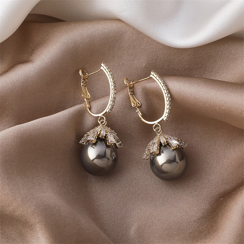 Pendentes de Pérola Malia Glamourosos – O acessório perfeito para qualquer ocasião!