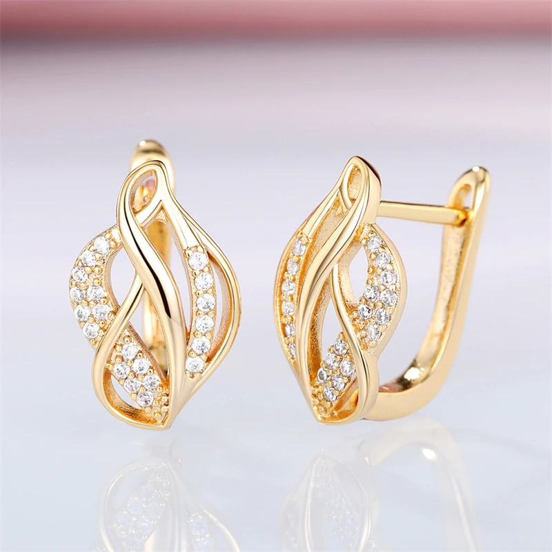 Brincos de ouro cintilantes e elegantes para uma aparição radiante