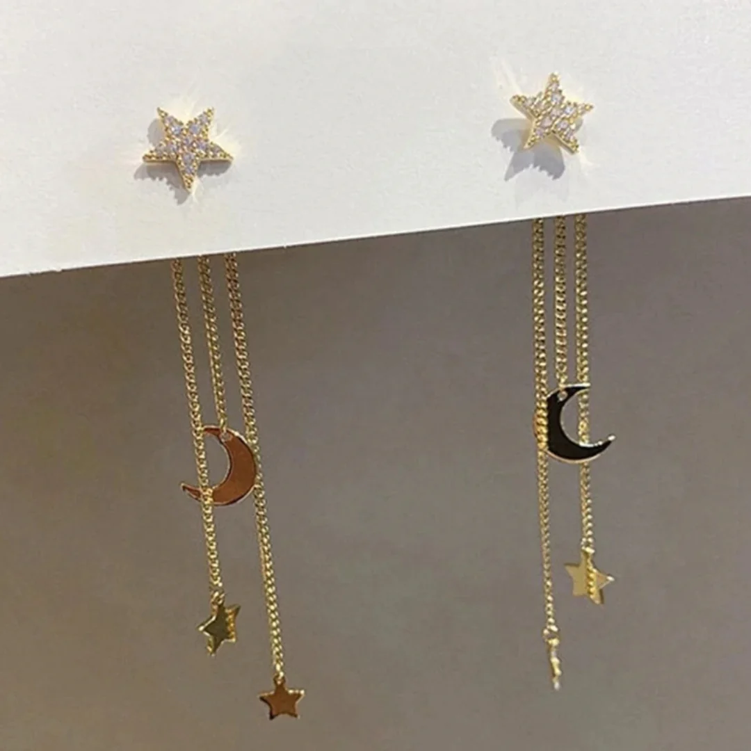 Brincos glamourosos com brilhantes estrelas douradas