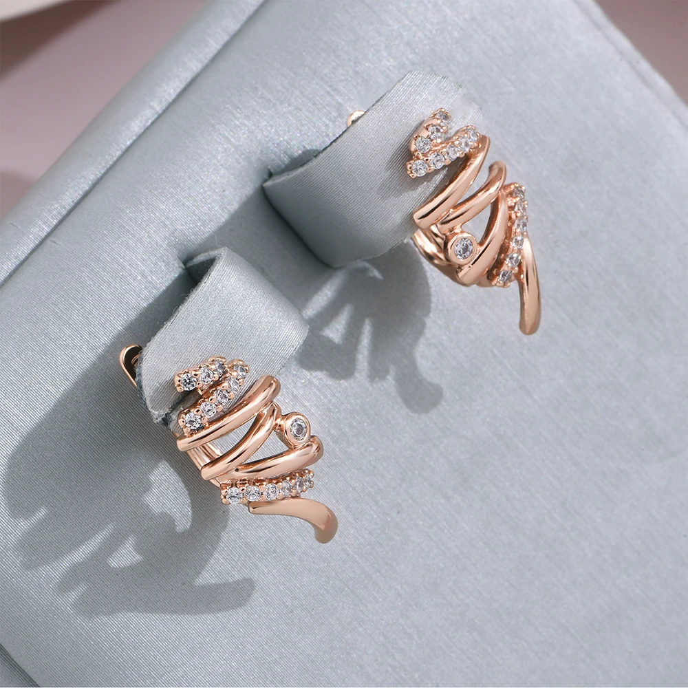 Brincos espirais brilhantes em ouro de altíssima qualidade – pura elegância em cada detalhe!