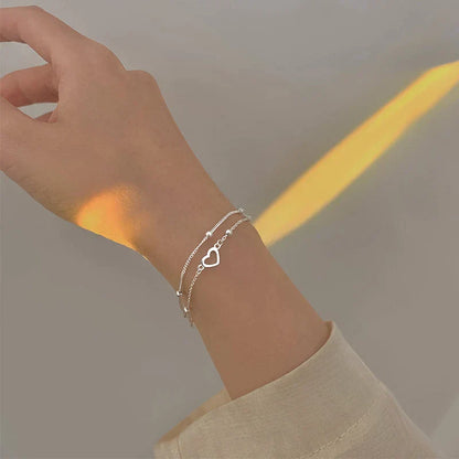 Pulseira de coração ajustável elegante em prata nobre