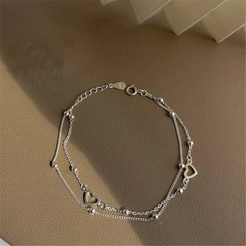 Pulseira de coração ajustável elegante em prata nobre