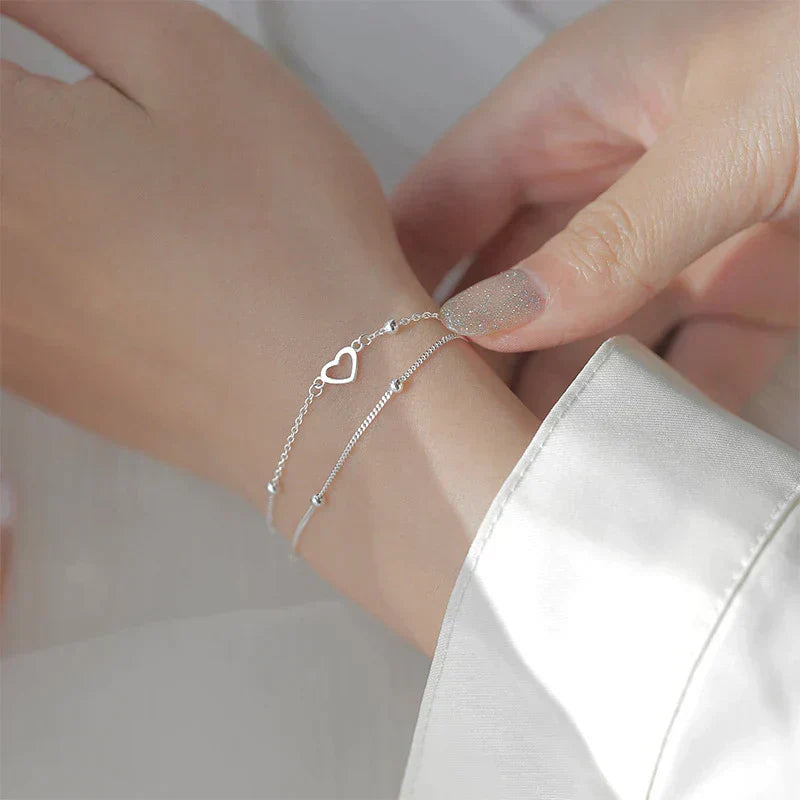 Pulseira de coração ajustável elegante em prata nobre