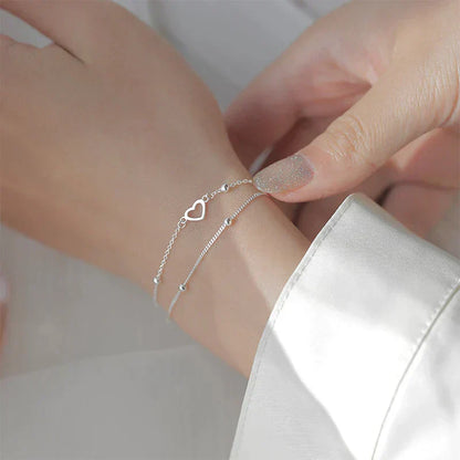 Pulseira de coração ajustável elegante em prata nobre