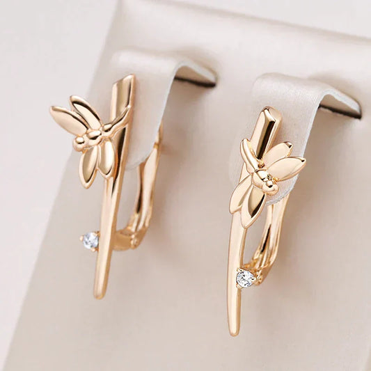 Brincos de libélula dourados cintilantes com pedras de zircônia glamourosas