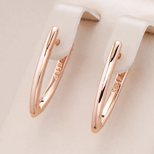 Brincos de ponta dourados elegantes para o look perfeito