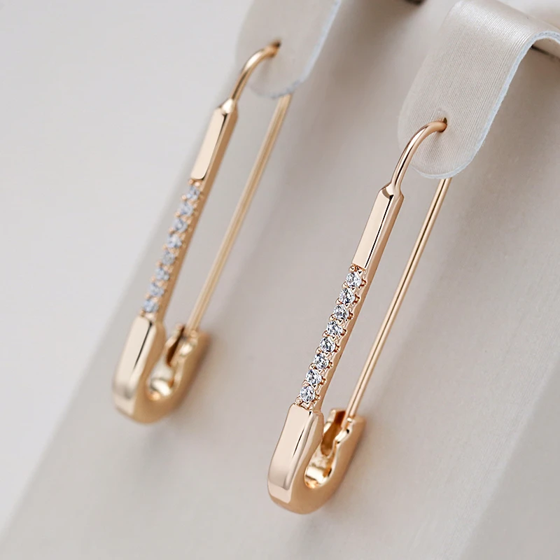 Elegantes brincos de clip dourados - Perfeito para qualquer ocasião!