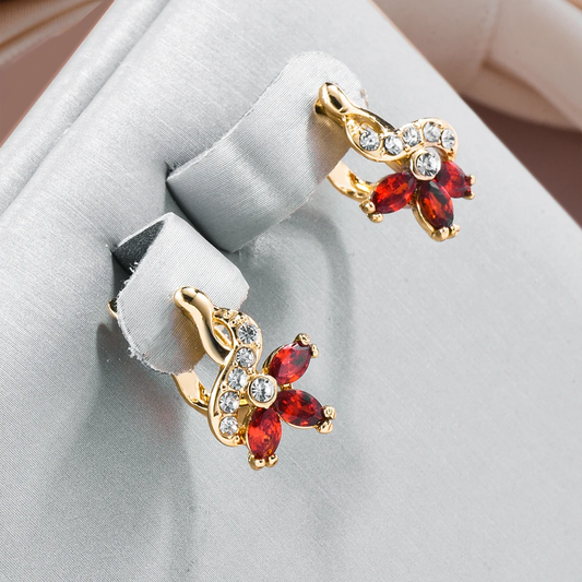 Fascinantes brincos de cristal vermelho no encantador estilo margarida